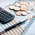 Personal finance management plan with budget chart and savings jar