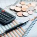 The Ultimate Guide to Personal Finance Management 3 Personal finance management plan with budget chart and savings jar