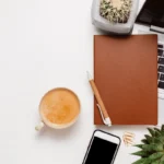 Starting an online business with laptop, e-commerce icons, and financial planning