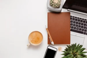 Starting an online business with laptop, e-commerce icons, and financial planning